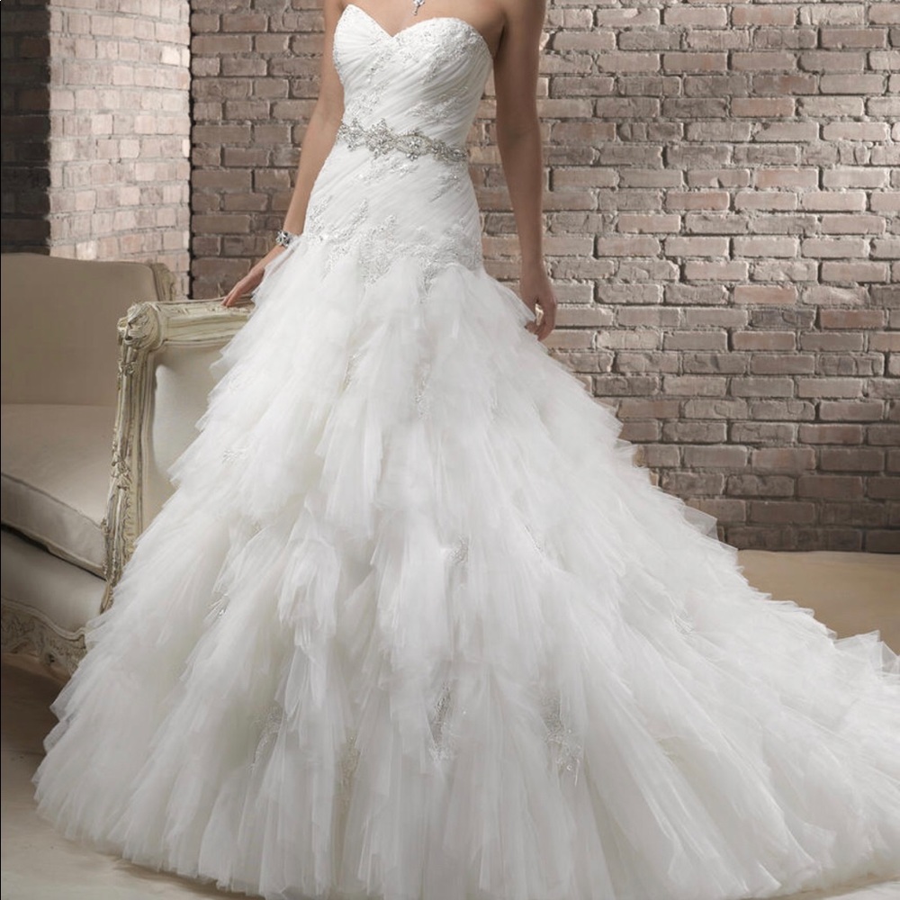 Genuine Maggie Sottero Sharmee wedding dress, never worn or altered, size 6